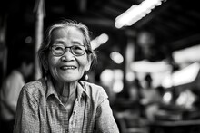 Portrait Of Old Woman With Eyeglasses In Bangkok, Thailand