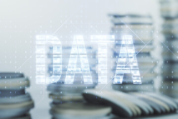 Wall Mural - virtual data word sign hologram on stacks of coins background. multiexposure