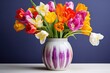 a vase full of vibrant tulips