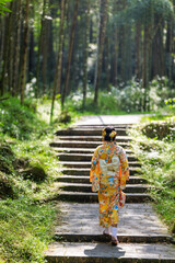 Sticker - Woman wear kimono walk inside the forest