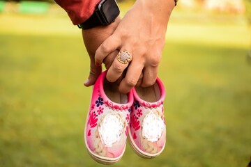 indian couple posing for maternity shoot pose for welcoming new born baby in lodhi road in delhi ind