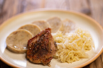 Wall Mural - typical Czech cuisine pork with dumplings and cabbage