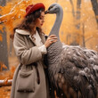 Beautiful girl and ostrich