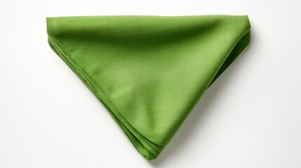 Canvas Print - Top view of single folded green linen serviette isolated on white background