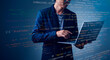 © Gasorn - Businessman with software, data hologram and code analytics, information technology, and gdpr overlay. Programmer coding or IT person reading html script, programming, and cyber security research