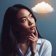 Photo of a pensive brunette holding her chin and looking up with  thought cloud drawn above her head