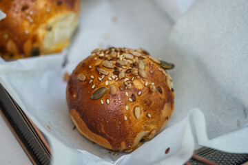 Wall Mural - Cheeseburger with seeds and caramelized onions