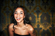 © Jeff Bergen/peopleimages.com - Woman, happy and laugh at nightclub in portrait, laughing and funny or enjoy at event, fun and relax. Mexican female person, smile and positive at party, energy and excited on face, comedy and club