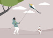 A young character flying a kite on a windy day while enjoying quality time with their jack russel puppy