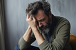 © Anna - A distressed man showing signs of despair and sadness