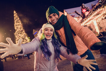 Poster - Photo of positive excited american guy lady wear windbreakers open arms ready hug you xmas time outside urban market park