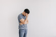 © Sevendeman - Unpleasant feeling emotion of asian man isolated on white. Depressed and Stress.