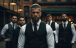 Handsome tattooed gangster man, with a beard in a luxurious suit, standing with a group of brothers