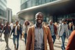 African Man Walking in Modern City, Handsome Black Guy Walks on a Crowded Pedestrian Street.
