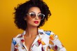 © IlluGrapix - Model woman in summer with glasses on yellow background. Fashion cool girl posing in sunglasses. Laughing while posing in studio