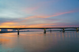 Fototapeta Pomosty - Vinh Tuy bridge crossing Red river in Hanoi during twilight