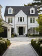 White modern house home beautiful farmhouse cottage transitional classic architecture view of exterior front lawn and paved driveway