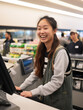© kalafoto - Happy AsiAn-American female supermarket clerk