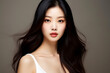 © ribalka yuli - Beautiful young Asian woman with clean fresh skin on grey background, Face care, Facial treatment, Cosmetology, beauty and spa, Asian women portrait.