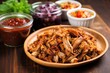 © Alfazet Chronicles - pulled pork with vegan vinegar sauce beside it