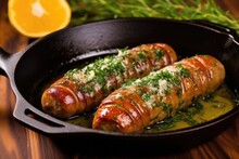pan-seared sausage with herbs and butter