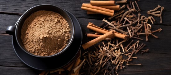 Sticker - Licorice tea with dried root and powder on wooden table top view