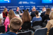 © Anton Gvozdikov - Back view of male professional attending conference meeting at export forum