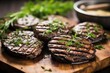 close-up of juicy grilled portobello mushroom with fresh herbs