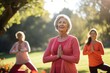 © AKKA - Active graceful Senior Women and Man friend Practicing Yoga in house Stretching muscle health, workout, and training with the retirement community