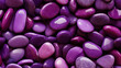 Photorealistic seamless pattern of purple pebbles.