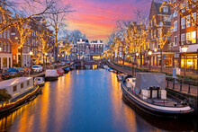 City Scenic From Amsterdam At Christmas Time In The Netherlands At Sunset
