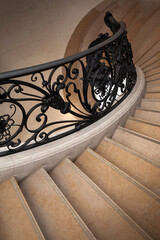 Wrought iron stair railing inside a Parisian palace