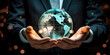 © David - Businessman holding virtual planet Earth in his hands
