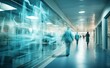 © Яна Деменишина - Doctors or nurses walk along the hospital corridor, motion blurred.