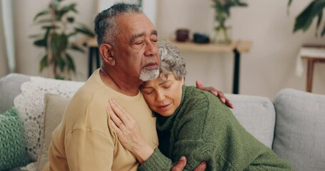 Poster - Senior couple, love and hug for empathy and comfort or security on home sofa. Elderly man and sad woman embrace and together in living room for care, compassion and support or sympathy in retirement