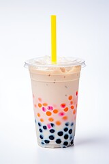 Wall Mural - A plastic cup filled with bubble tea and a yellow straw