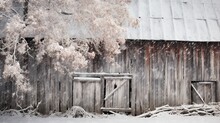  A Barn With A Tree Next To It And Snow Falling On The Ground And On The Roof Of The Barn, And On The Side Of The Barn Is A Snow Covered Fence.  Generative Ai