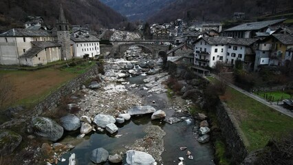 Wall Mural - most beautiful Alpine villages of northern Italy- Lillianes, medieval borgo in Valle d'Aosta region, aerial drone view.
