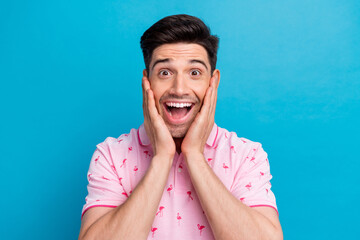 Poster - Photo of funky astonished person open mouth arms touch cheeks cant believe isolated on blue color background