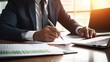© Meow Creations - Businessman Analyzing Data at Desk