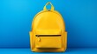 a yellow backpack on a blue background