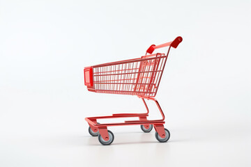 Sticker - A red shopping cart sitting on a clean, white surface. Perfect for illustrating consumerism, retail, or online shopping.