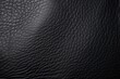 A detailed close-up of a black leather surface. Perfect for fashion or interior design projects