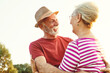 © Lumos sp - woman man outdoor senior couple happy lifestyle retirement together smiling love old nature mature elderly vitality active