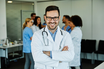 Wall Mural - doctor nurse portrait man hospital group team medical uniform health surgeon adult stethoscope smiling professional clinic medicine male happy female occupation teamwork care