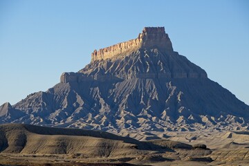 Wall Mural - The landscape in Southern Utah is one of the most unique and otherworldly scenes in the United States. Pictured here is the Factory Butte, a notable landform in the area.