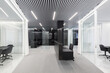 © ADDICTIVE STOCK - Modern office with striped ceiling design
