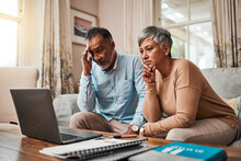 Senior Couple, Stress And Laptop For Financial Debt, Budget Mistake And Investment Fail Or Asset Management At Home. Elderly People With Depression, Thinking Or Reading News Or Email On Computer