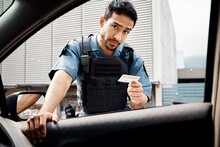 Car, Drivers License Or Police Officer In City To Check Info For Law Enforcement, Protection Or Street Safety. Cop Portrait, Traffic Stop Or Security Guard On Patrol In A Town For Crime Or Justice