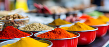 Different Kinds Of Colorful Spices Are In Bowls
